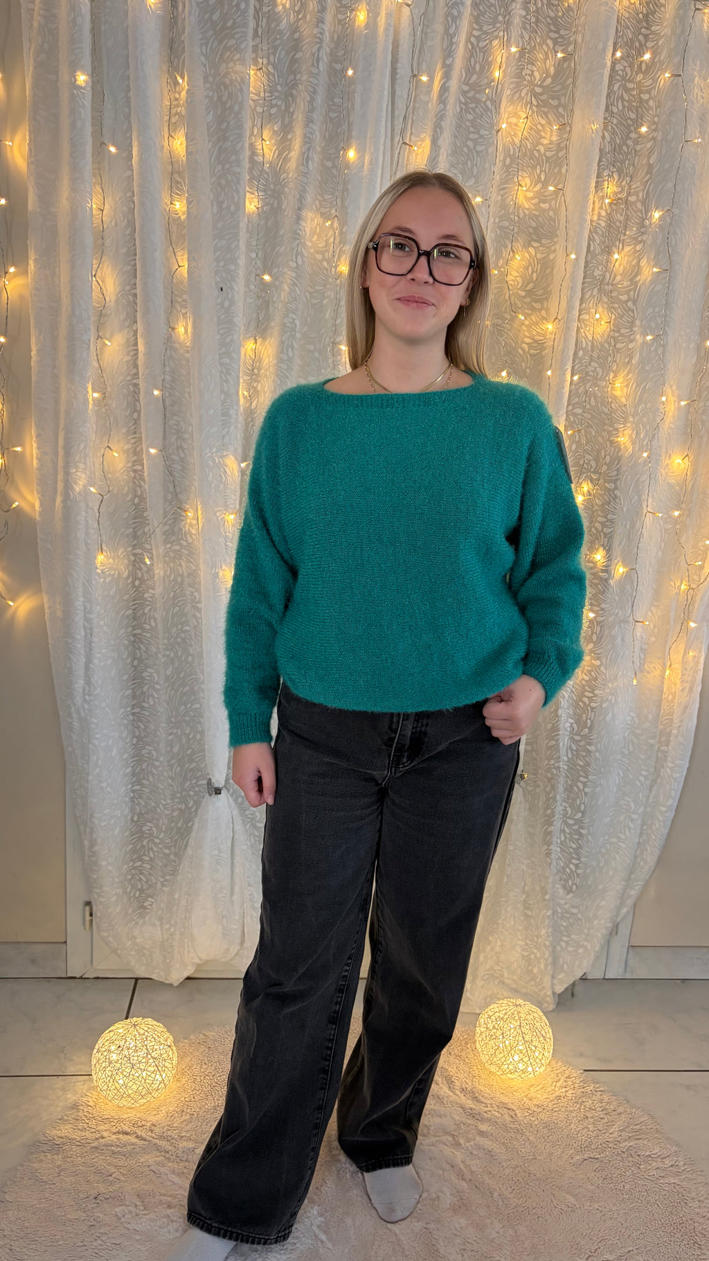 Pull bouton dans le dos