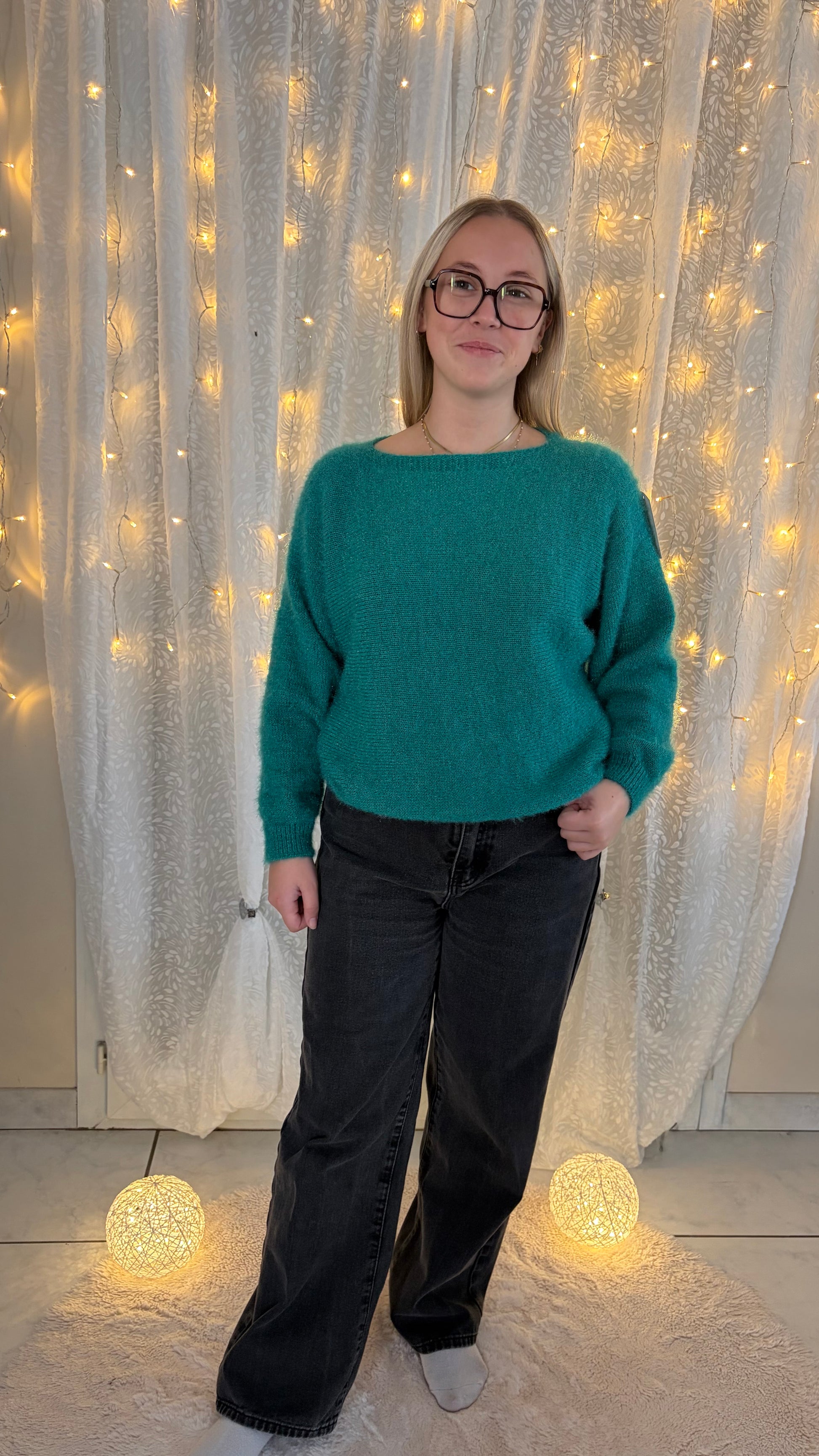 Pull bouton dans le dos